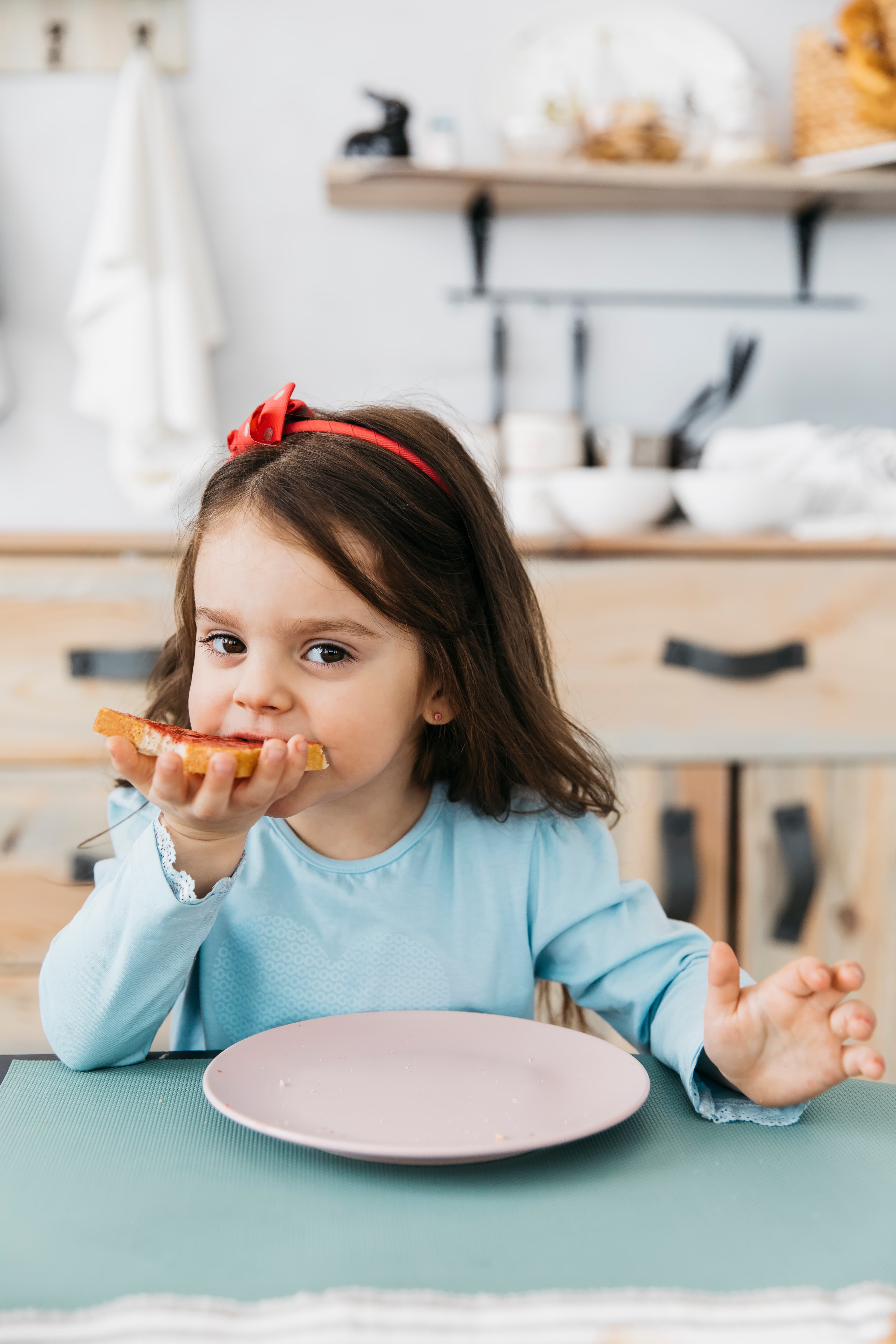 Young child enjoying breakfast